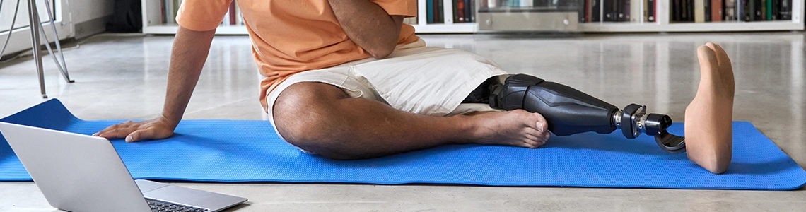 Person wearing a Prosthetic Leg Watching Prosthetics Videos for Educational Training Videos for Prosthetics